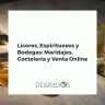 Variedad de licores, vinos y copas, con ingredientes de coctelería y un ordenador para venta online