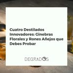Cuatro botellas de destilados innovadores, dos de ginebra floral y dos de ron añejo, dispuestas elegantemente sobre mármol.